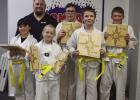 Students earn yellow belts